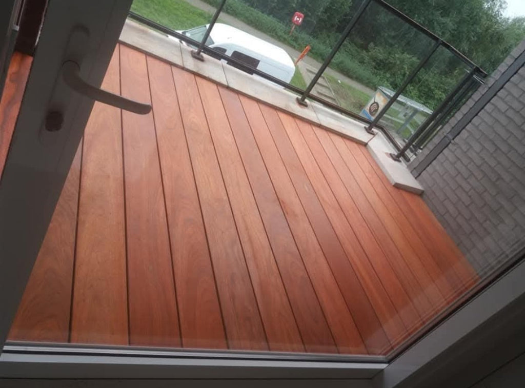 Houten terras in padouk, voor en na